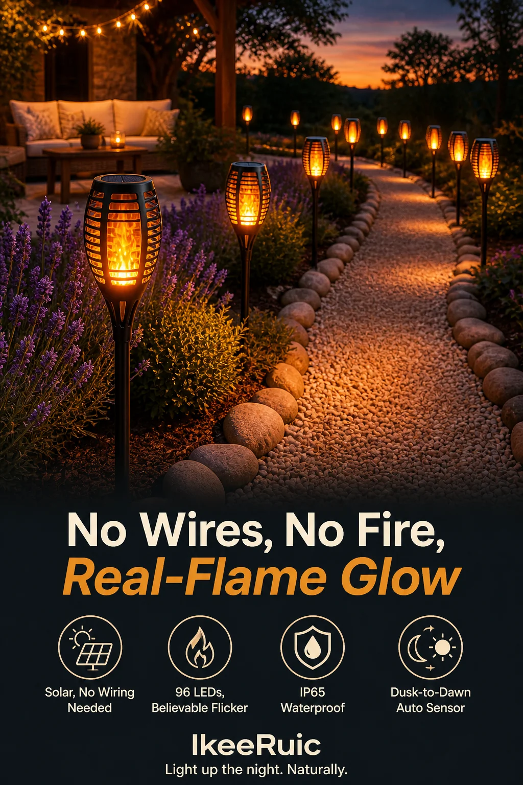IkeeRuic solar torch lights with realistic flames in a garden setting at dusk